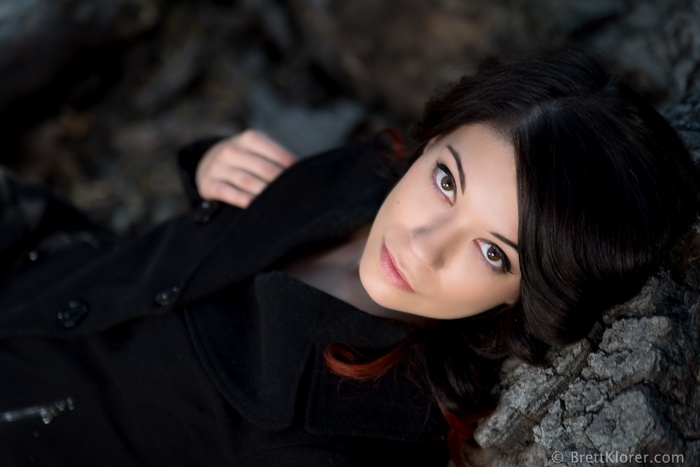 Woman with dark hair and brown eyes