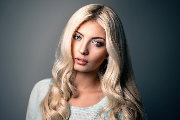 Portrait of a blonde woman with blue eyes