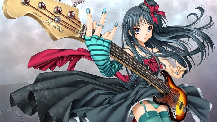 Akiyama Mio from K-ON! playing a Fender Jazz Bass