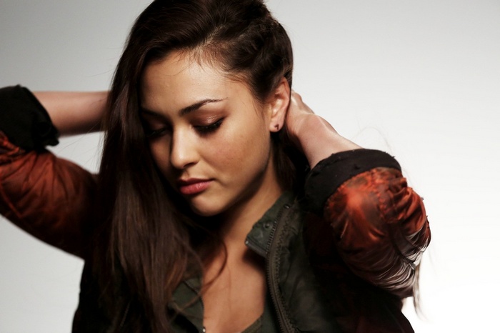 Lindsey Morgan with hands in her hair