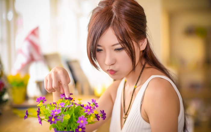 Asian woman with flowers