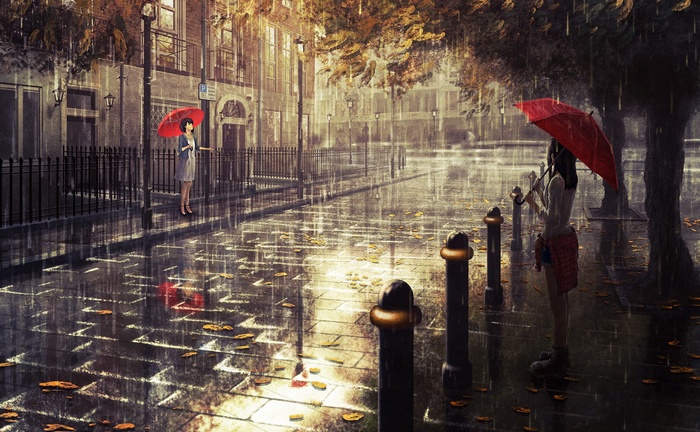 Two girls with red umbrellas in the rain on a London street