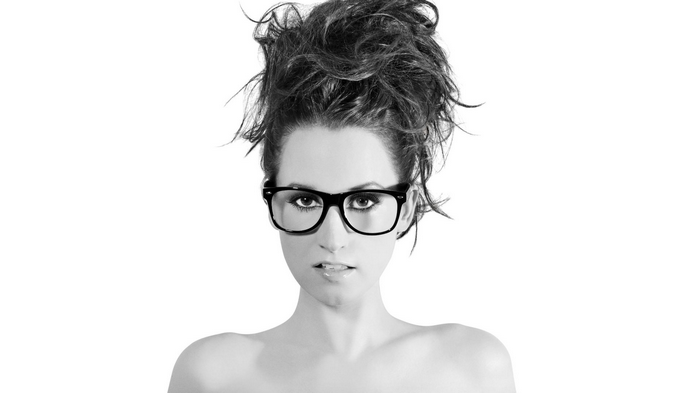 Monochrome portrait of Ingrid Michaelson with glasses