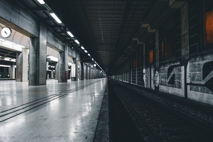Subway station with graffiti on the wall