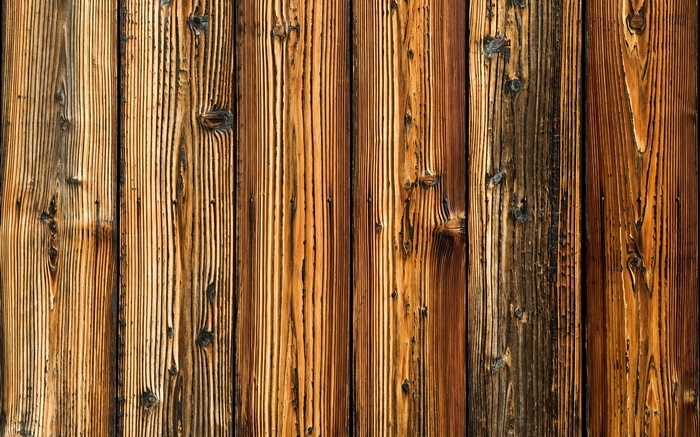 Close-up of weathered wooden planks with prominent grain