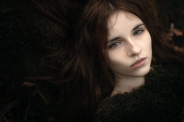 Portrait of a woman with freckles