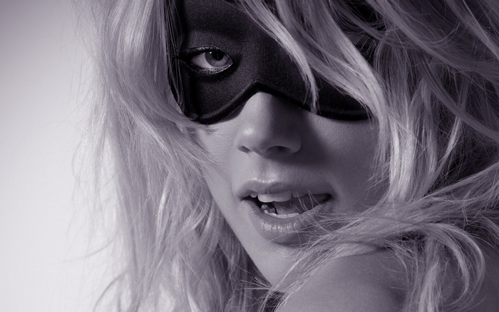 Amber Heard wearing a black mask