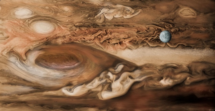 Jupiter and its moon Europa in space