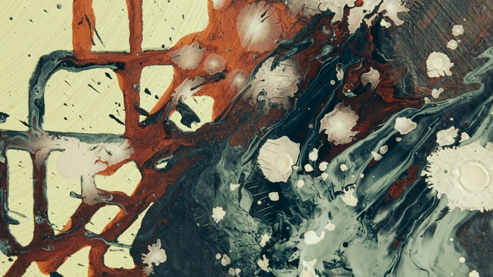 Abstract painting with paint splatters and drips