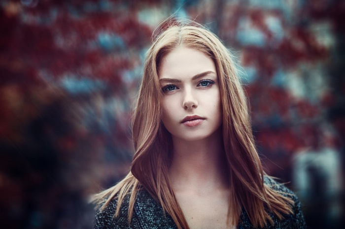 Young woman with blonde hair and blue eyes