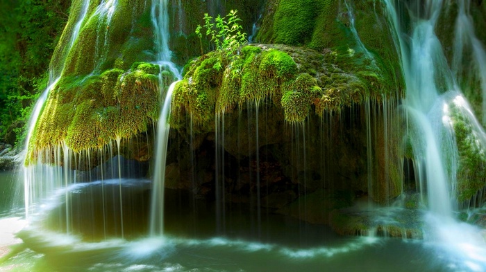 Mossy waterfall in Romania with long exposure