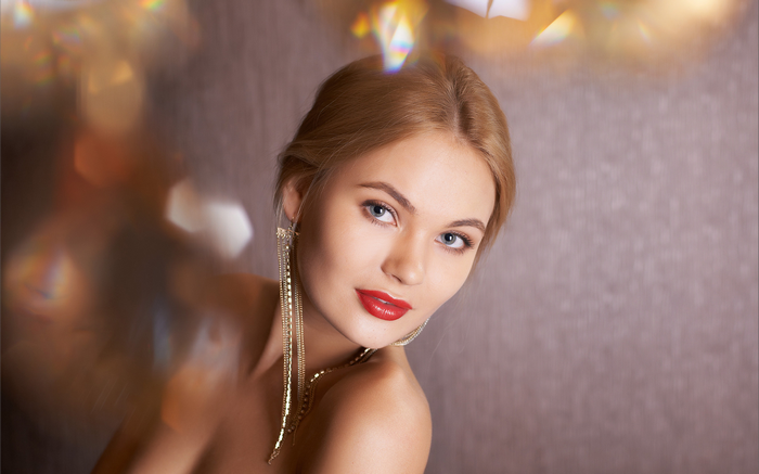 Talia Cherry portrait with glamour earrings