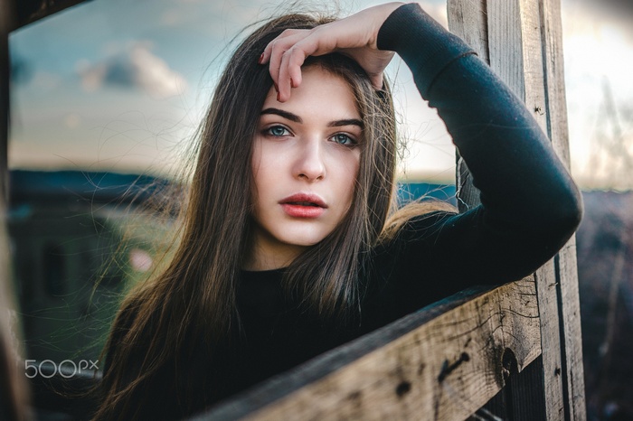Portrait of a young woman with blue eyes