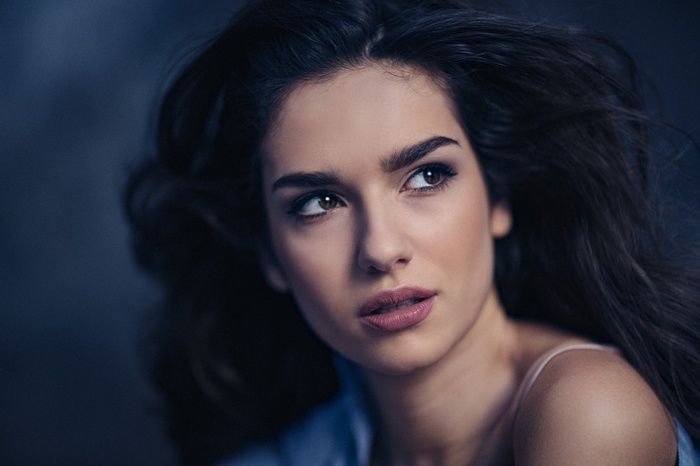 Portrait of a woman looking away