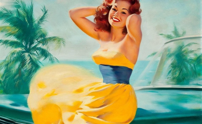 Pinup model posing by a car on a tropical beach
