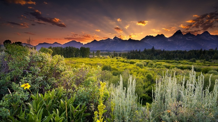 Sunset over the Teton mountain range landscape