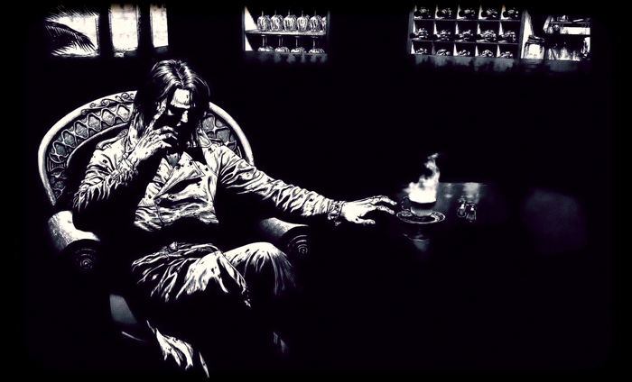 Tae Soo Park sitting in a chair with a cup of coffee
