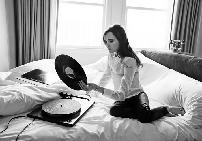 Ellen Page with vinyl record and gramophone in bed