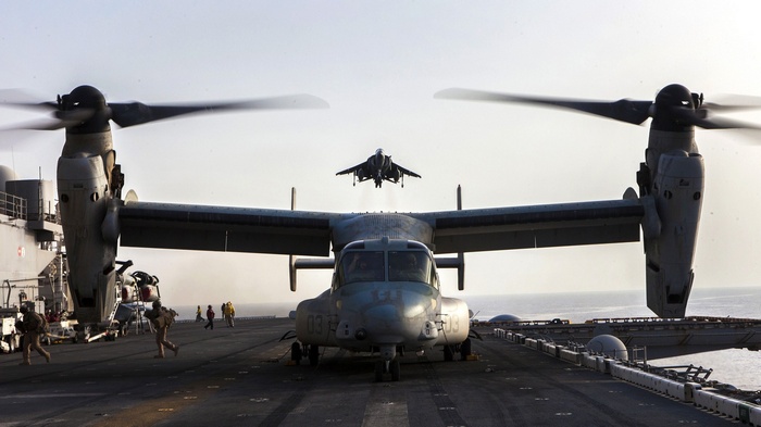 Boeing-Bell V-22 Osprey and AV-8B Harrier II on aircraft carrier