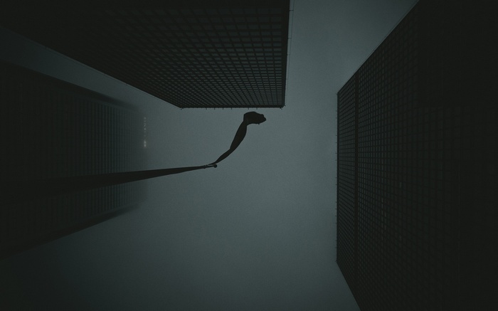 A figure falls between skyscrapers in the mist