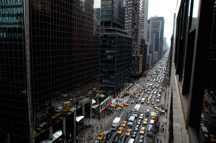 New York City street with heavy traffic and tall buildings