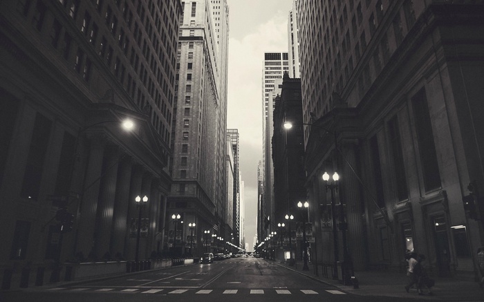 Chicago street with tall buildings and streetlights