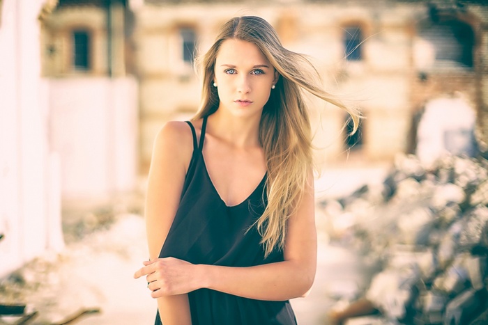 Blonde woman in a black dress