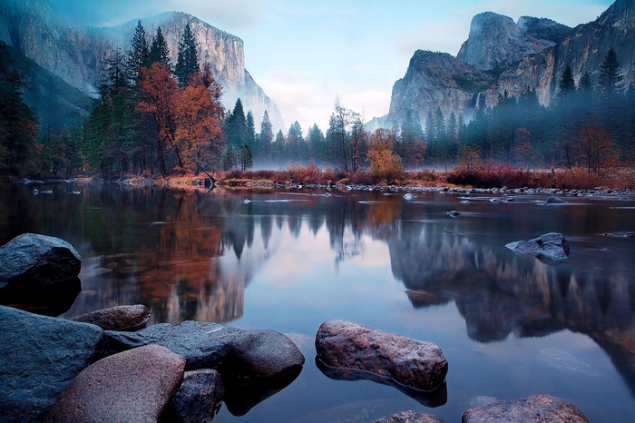 Misty Mountains and River in Autumn