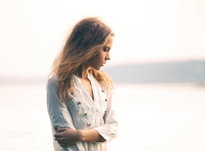 Portrait of Ksenia Kokoreva by the water