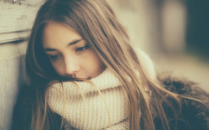Teen girl wearing a scarf
