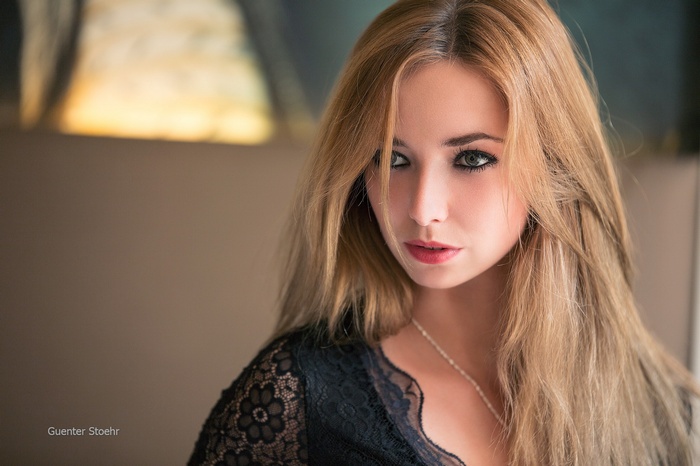 Model Guenter Stoehr with blonde hair and makeup
