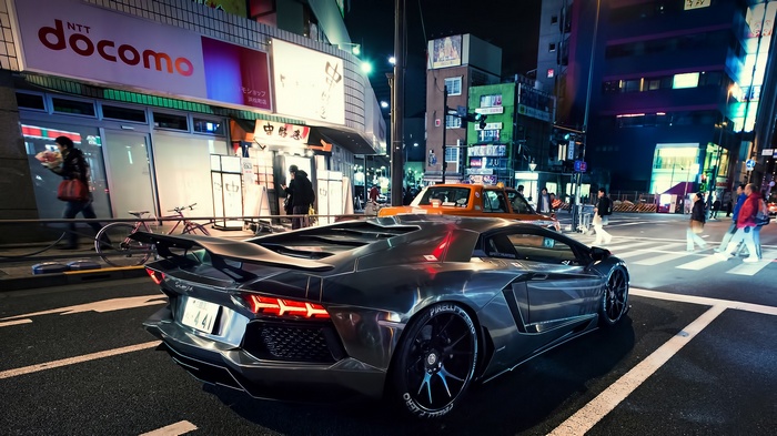 Lamborghini Aventador on a city street at night