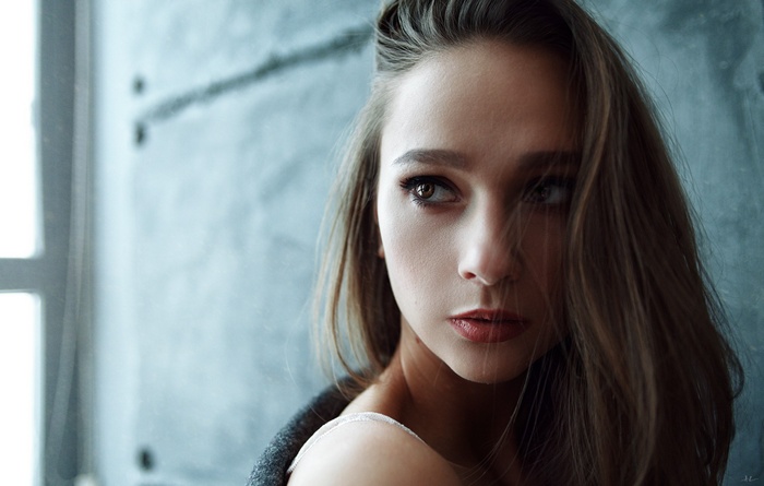 Portrait of a young woman with auburn hair by Kirill Averyanov