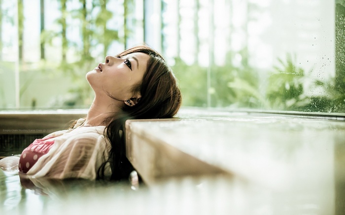 Asian woman in swimming pool