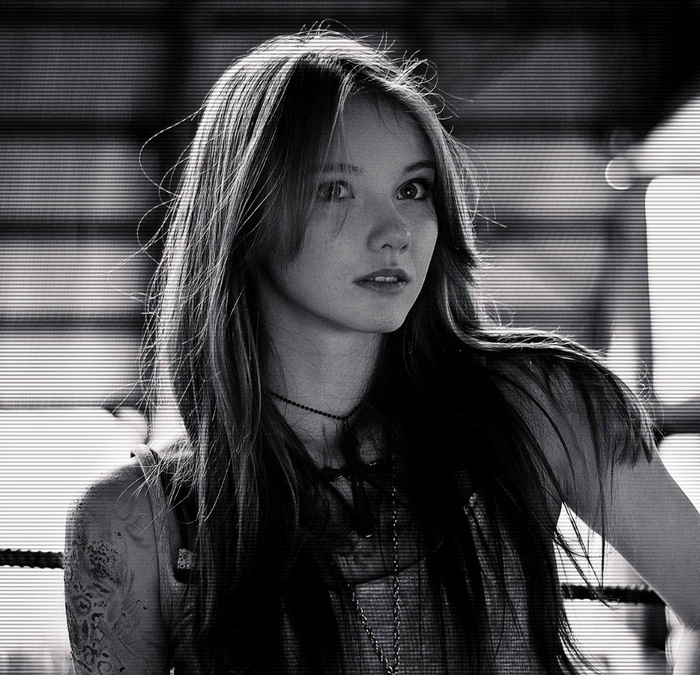 Olesya Kharitonova in a black and white portrait