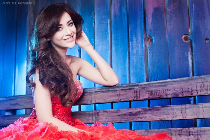 Annie Krislinzki in a red dress