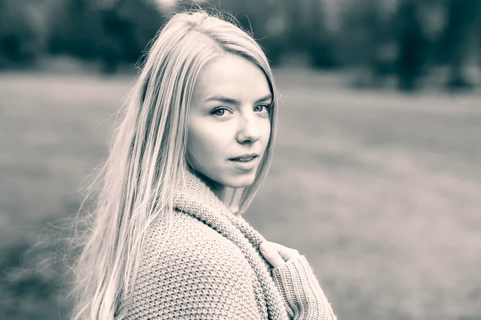 Woman in a knitted sweater outdoors