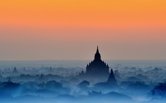 Temples in mist at sunrise in Bagan, Myanmar