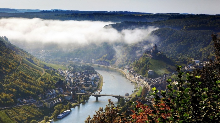 Castle on a hill overlooking a river valley in Germany