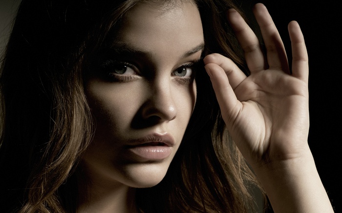 Barbara Palvin looking at viewer with hand near face
