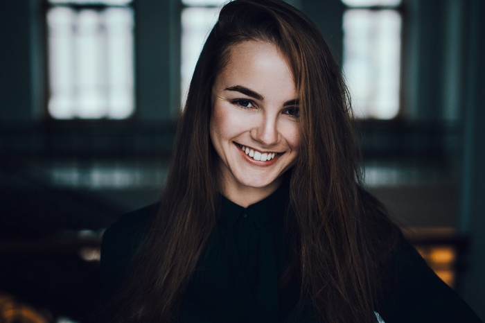 Julia Tavrina smiling, looking at viewer