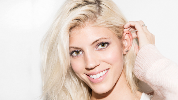 Devon Windsor smiling with blonde hair