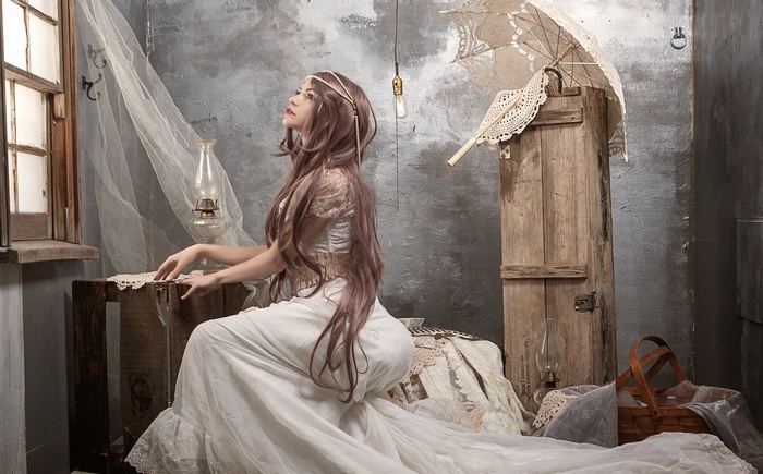Woman in a white dress with long hair