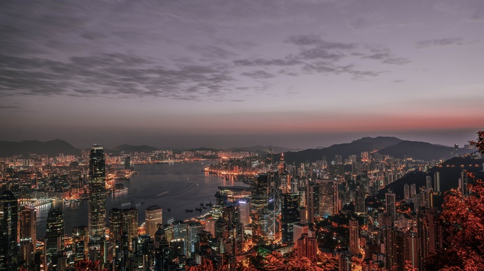 Hong Kong cityscape at dusk with Victoria Harbour