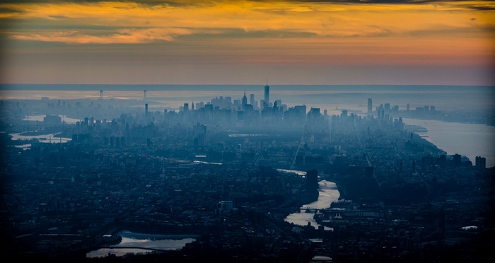 New York City skyline at sunrise with mist