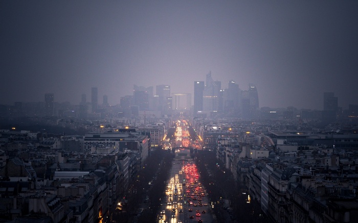 Paris skyline with traffic on a foggy day
