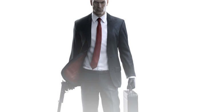 Agent 47 from Hitman holding a gun and briefcase