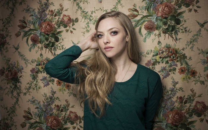 Amanda Seyfried with hand on head