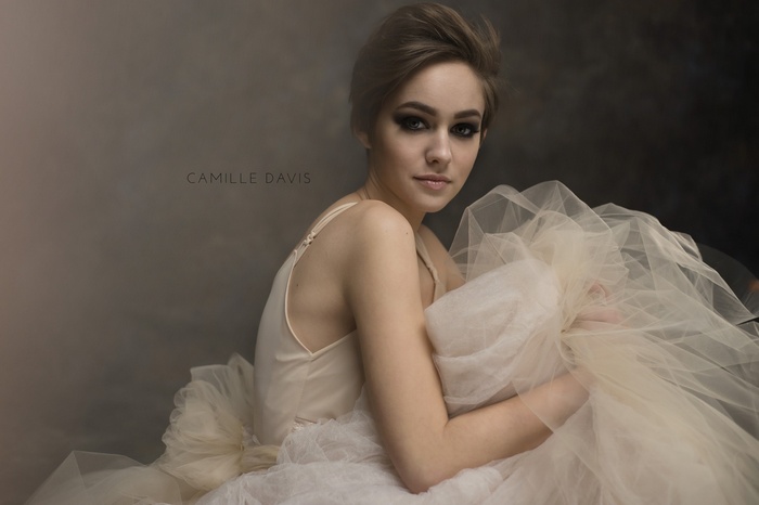 Portrait of a ballerina with smoky eyes by Camille Davis