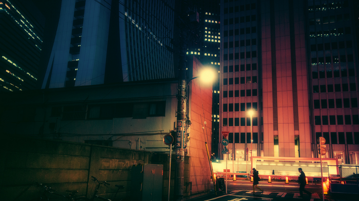 Night street scene in Tokyo with neon lights